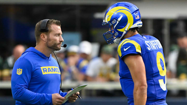 Oct 6, 2024; Inglewood, California, USA; Los Angeles Rams head coach Sean McVay talks to quarterback Matthew Stafford (9) during the third quarter against the Green Bay Packers at SoFi Stadium. Mandatory Credit: Robert Hanashiro-Imagn Images Oct 6, 2024; Inglewood, California, USA; Los Angeles Rams head coach Sean McVay talks to quarterback Matthew Stafford (9) during the third quarter against the Green Bay Packers at SoFi Stadium. Mandatory Credit: Robert Hanashiro-Imagn Images