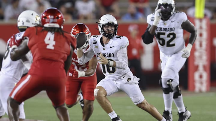 Sep 12, 2025; Houston, Texas, USA; Colorado Buffaloes quarterback Ryan Staub (16) scrambles with the ball during the fourth quarter against the Houston Cougars at TDECU Stadium. Mandatory Credit: Troy Taormina-Imagn Images