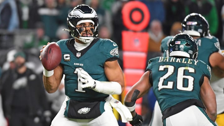 Dec 15, 2024; Philadelphia, Pennsylvania, USA; Philadelphia Eagles quarterback Jalen Hurts (1) looks for reciever against the Pittsburgh Steelers during the fourth quarter at Lincoln Financial Field. Mandatory Credit: Eric Hartline-Imagn Images
