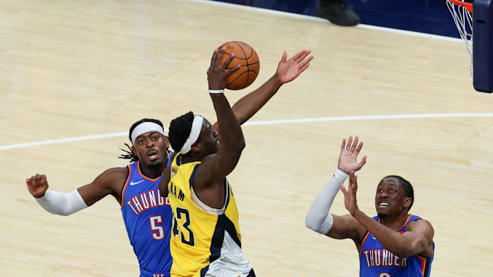 Jalen Williams (right) defends Pascal Siakam in the NBA Finals.