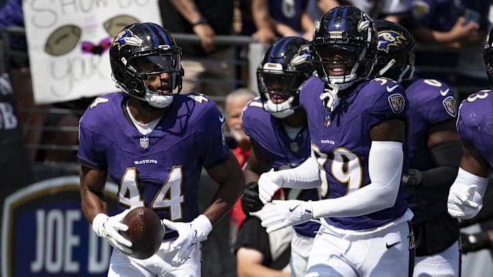 Sep 15, 2024; Baltimore, Maryland, USA; Baltimore Ravens cornerback Marlon Humphrey (44) celebrates with teammates zaftret intercepting as Las Vegas Raiders quarterback Gardner Minshew (not pictured) pass during the first half at M&T Bank Stadium. Mandatory Credit: Tommy Gilligan-Imagn Images Sep 15, 2024; Baltimore, Maryland, USA; Baltimore Ravens cornerback Marlon Humphrey (44) celebrates with teammates zaftret intercepting as Las Vegas Raiders quarterback Gardner Minshew (not pictured) pass during the first half at M&T Bank Stadium. Mandatory Credit: Tommy Gilligan-Imagn Images