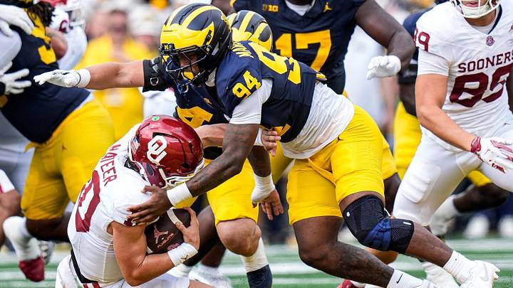 Michigan defensive end Nate Marshall sacks Oklahoma quarterback John Mateer Michigan defensive end Nate Marshall sacks Oklahoma quarterback John Mateer