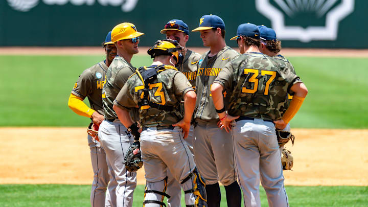West Virginia Head Coach Steve Sabins visits the mound as The LSU Tigers take on the West Virginia Mountaineers in game 1 of the 2025 NCAA Div 1 Super Regional Baseball Championship at Alex Box Stadium in Baton Rouge, LA. Saturday, June 7, 2025.
