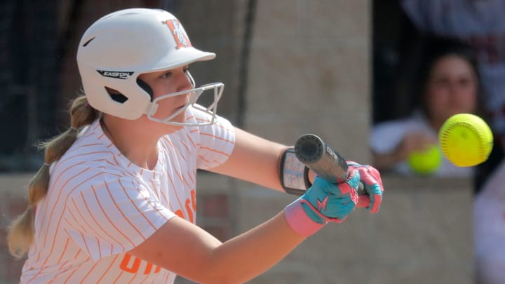 Kaukauna High School's Madi Deering (31) attempts to bunt versus Neenah in a Fox Valley Association softball game on May 15, 2025. Kaukauna High School's Madi Deering (31) attempts to bunt versus Neenah in a Fox Valley Association softball game on May 15, 2025.