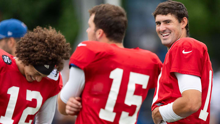 Indianapolis Colts quarterback Daniel Jones (17) laughs with the quarterbacks group Monday, July 28, 2025, during training camp held at Grand Park in Westfield.