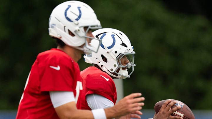 Indianapolis Colts quarterbacks Anthony Richardson Sr. (5) and Daniel Jones (17) drop back to pass Monday, July 28, 2025, during training camp held at Grand Park in Westfield. Indianapolis Colts quarterbacks Anthony Richardson Sr. (5) and Daniel Jones (17) drop back to pass Monday, July 28, 2025, during training camp held at Grand Park in Westfield.