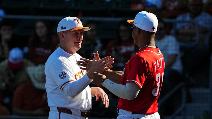 Texas Longhorns head coach Jim Schlossnagle greets Cincinnati Reds infielder Trey Faltine ahead of the annual Texas baseball alumni game at UFCU Disch-Falk Field on Saturday, Feb. 1, 2025.