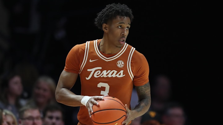 Texas Longhorns forward Dailyn Swain moves the ball against the Tennessee Volunteers during the first half at Thompson-Boling Arena at Food City Center. 