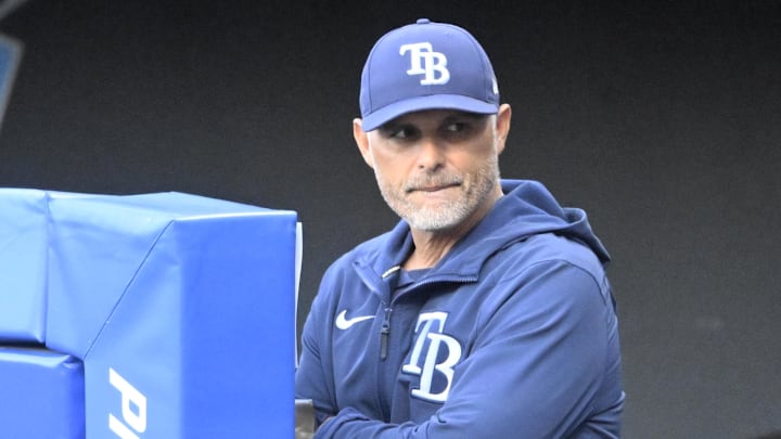 Aug 26, 2025; Cleveland, Ohio, USA; Tampa Bay Rays manager Kevin Cash (16) stands in the dugout in the first inning against the Cleveland Guardians at Progressive Field. 