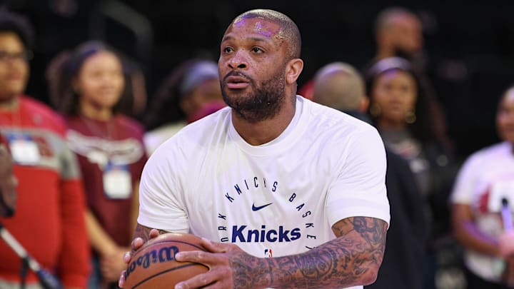 Mar 22, 2025; New York, New York, USA; New York Knicks forward P.J. Tucker (17) warms up before the game against the Washington Wizards at Madison Square Garden. Mandatory Credit: Vincent Carchietta-Imagn Images