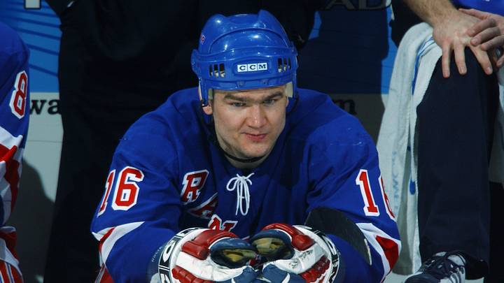 Bobby Holik looks on