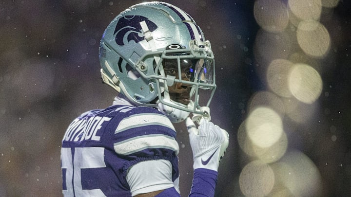 Kansas State senior cornerback Ekow Boye-Doe (25) looks back towards the sidelines as rain falls during the game.
