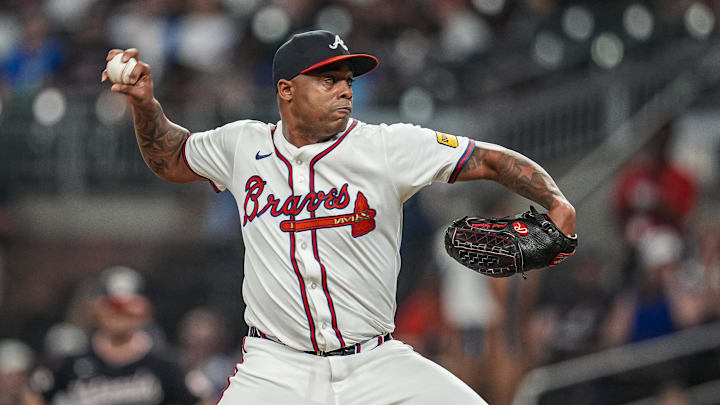 Sep 23, 2025; Cumberland, Georgia, USA; Atlanta Braves relief pitcher Raisel Iglesias (26)  pitches against the Washington Nationals during the ninth inning at Truist Park. Mandatory Credit: Dale Zanine-Imagn Images