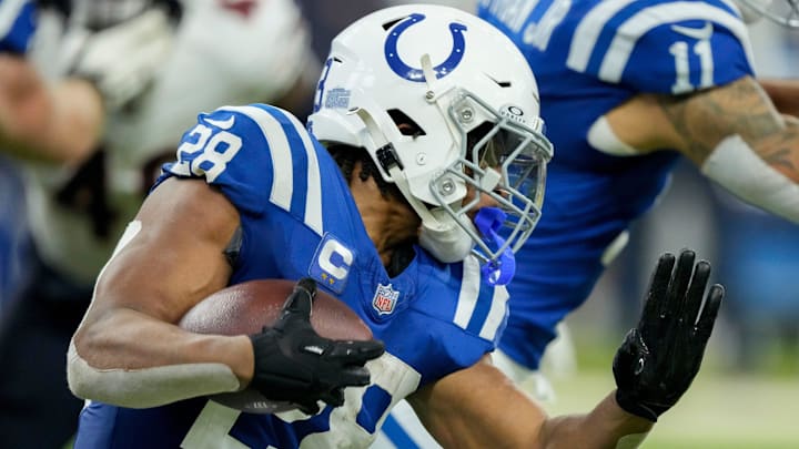 Indianapolis Colts running back Jonathan Taylor (28) rushes the ball Sunday, Sept. 22, 2024, during a game against the Chicago Bears at Lucas Oil Stadium in Indianapolis. He did not play against the Jacksonville Jaguars on Oct. 6, 2024.