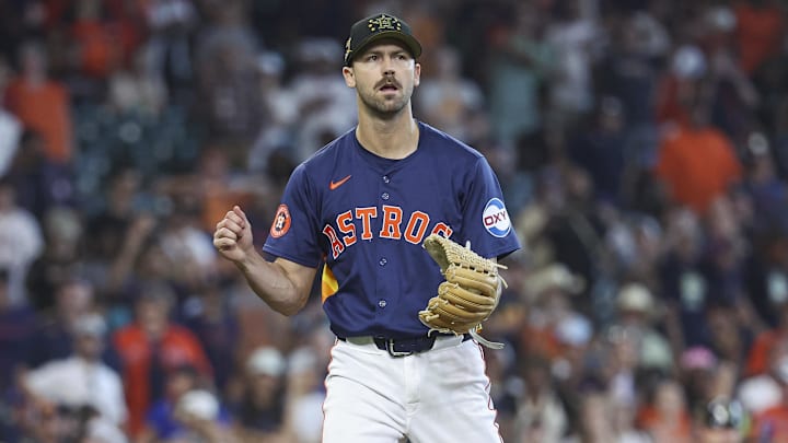 May 19, 2024; Houston, Texas, USA; Houston Astros relief pitcher Tayler Scott (50) reacts after the final out during the ninth inning against the Milwaukee Brewers at Minute Maid Park. 