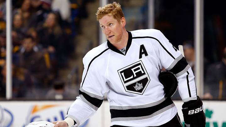 Jan 31, 2015; Boston, MA, USA; Los Angeles Kings defenseman Matt Greene (2) picks up his helmet against the Boston Bruins during the second period at TD Garden. Mandatory Credit: Winslow Townson-USA TODAY Sports Jan 31, 2015; Boston, MA, USA; Los Angeles Kings defenseman Matt Greene (2) picks up his helmet against the Boston Bruins during the second period at TD Garden. Mandatory Credit: Winslow Townson-USA TODAY Sports