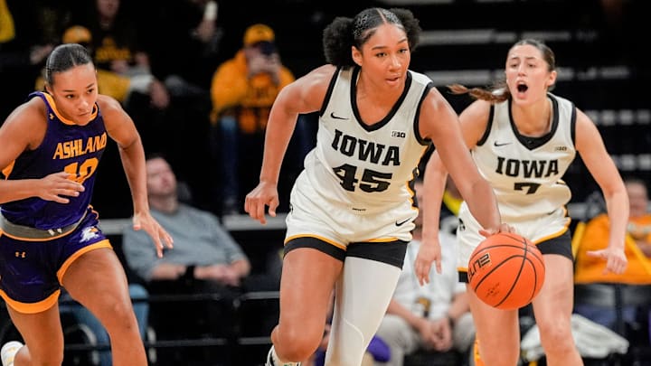 Iowa forward Hannah Stuelke (45) dribbles down court Oct. 30, 2025 during an exhibition game against the Ashland Eagles at Carver-Hawkeye Arena in Iowa City, Iowa. Iowa forward Hannah Stuelke (45) dribbles down court Oct. 30, 2025 during an exhibition game against the Ashland Eagles at Carver-Hawkeye Arena in Iowa City, Iowa.