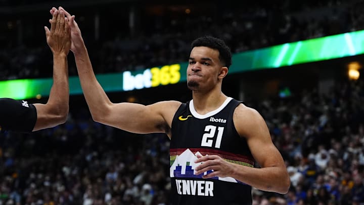 Dec 25, 2025; Denver, Colorado, USA; Denver Nuggets forward Spencer Jones (21) reacts against the Minnesota Timberwolves during the second half at Ball Arena. Mandatory Credit: Ron Chenoy-Imagn Images
