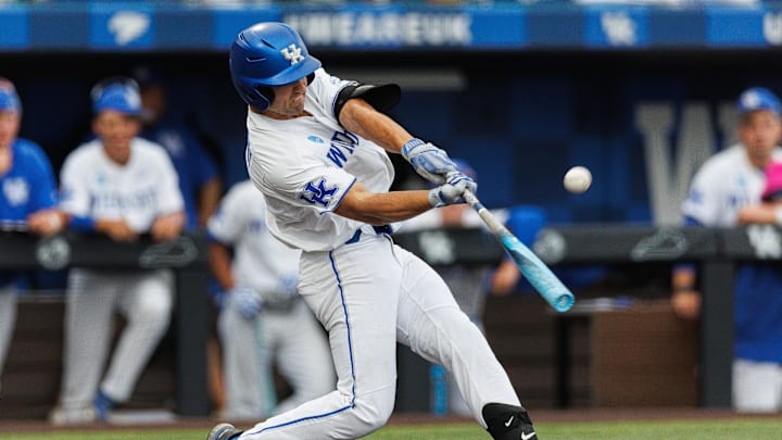 Jun 8, 2024; Lexington, KY, USA; Kentucky Wildcats outfielder Ryan Waldschmidt (21) hits a pitch during the sixth inning against the Oregon State Beavers at Kentucky Proud Park. Mandatory Credit: Jordan Prather-Imagn Images