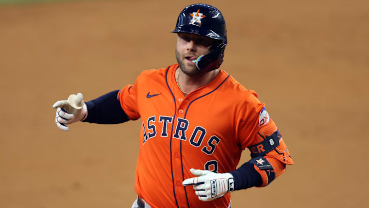 Sep 6, 2025; Arlington, Texas, USA; Houston Astros first baseman Christian Walker (8) rounds the bases after hitting a solo home run against the Texas Rangers during the third inning at Globe Life Field. 