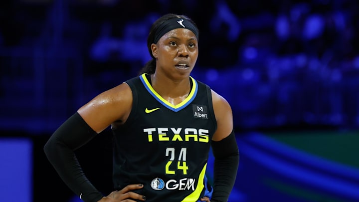 Dallas Wings guard Arike Ogunbowale was arrested and charged with misdemeanor battery on Thursday, according to Miami-Dade County records.
