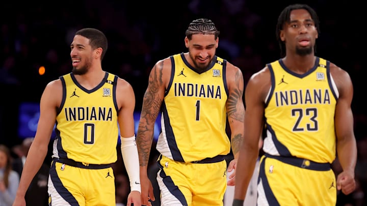 Feb 1, 2024; New York, New York, USA; Indiana Pacers guard Tyrese Haliburton (0) and forwards Obi Toppin (1) and Aaron Nesmith (23) react during the second quarter against the New York Knicks at Madison Square Garden. Mandatory Credit: Brad Penner-Imagn Images