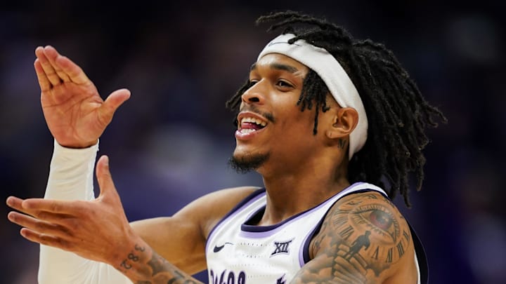 Dec 17, 2024; Kansas City, Missouri, USA; Kansas State Wildcats guard Dug McDaniel (0) celebrates during the second half against the Drake Bulldogs at T-Mobile Center. Mandatory Credit: Jay Biggerstaff-Imagn Images