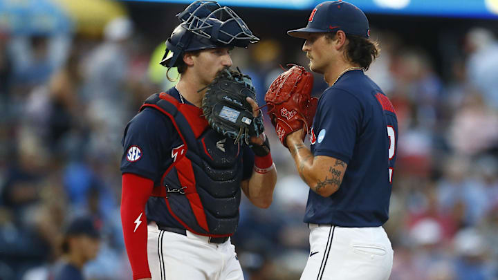 May 30, 2025; Oxford, Mississippi, USA; Mississippi Rebels catcher Austin Fawley (24) and starting pitcher Riley Maddox (2) talk during the third inning against the Murray State Racers. Mandatory Credit: Petre Thomas-Imagn Images