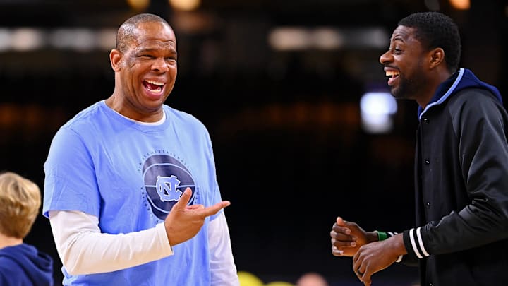 UNC basketball head coach Hubert Davis and former Tar Heel wing Jackie Manuel
