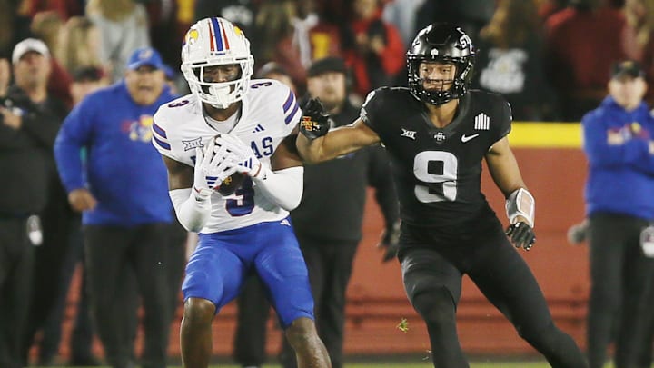 Kansas Jayhawks cornerback Mello Dotson (3) intercepts a pass intended to a Iowa State Cyclones wide receiver