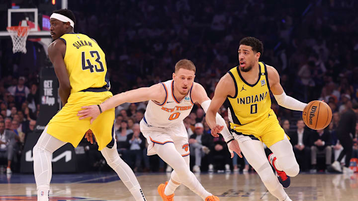 May 19, 2024; New York, New York, USA; Indiana Pacers forward Pascal Siakam (43) sets a pick for guard Tyrese Haliburton (0) against New York Knicks guard Donte DiVincenzo (0) during the first quarter of game seven of the second round of the 2024 NBA playoffs at Madison Square Garden. Mandatory Credit: Brad Penner-USA TODAY Sports