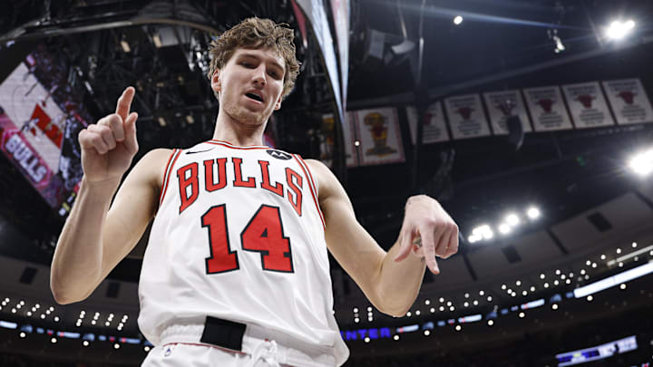 Nov 22, 2025; Chicago, Illinois, USA; Chicago Bulls forward Matas Buzelis (14) reacts after scoring against the Washington Wizards during the first half at United Center. Mandatory Credit: Kamil Krzaczynski-Imagn Images