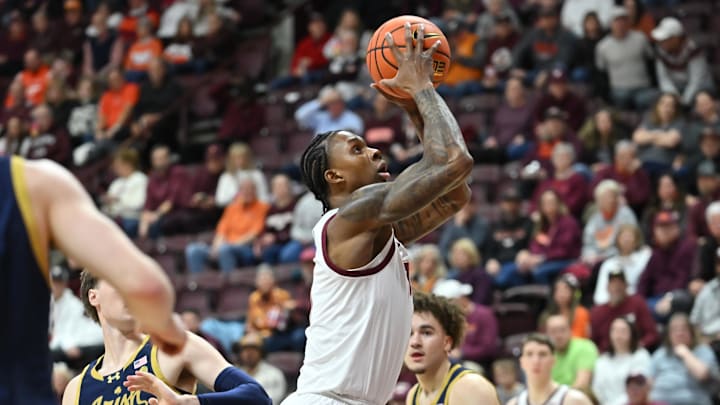 Jan 17, 2026; Blacksburg, Va.; Virginia Tech forward Tobi Lawal (1) goes up for a shot against Notre Dame.