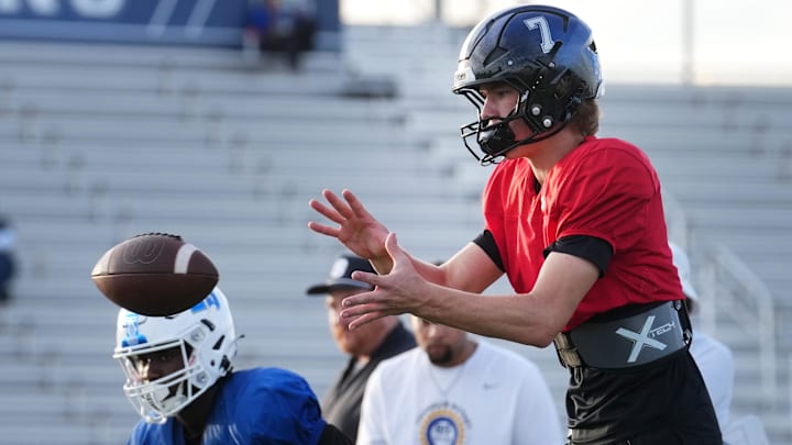 Chandler Wolves quarterback Will Mencl practices with his team at Chandler High School on Nov. 3, 2025.