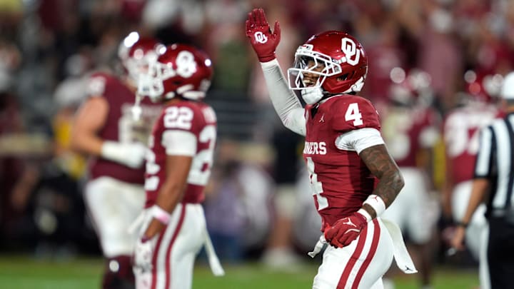 Oklahoma cornerback Courtland Guillory (4) fires up the crowd during the Sooners' 24-13 win over Michigan. Oklahoma cornerback Courtland Guillory (4) fires up the crowd during the Sooners' 24-13 win over Michigan.