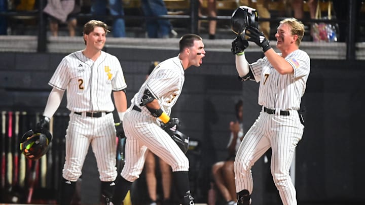 Southern Miss Golden Eagles infielder Seth Smith (3) reacts with teammates after a home run against the Mississippi State Bulldogs at Pete Taylor Park in Hattiesburg, Miss., on March 3, 2026.