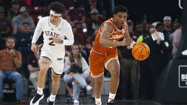 Mar 4, 2025; Starkville, Mississippi, USA; Texas Longhorns guard Julian Larry (1) dribbles during the first half against the Mississippi State Bulldogs at Humphrey Coliseum. Mandatory Credit: Petre Thomas-Imagn Images