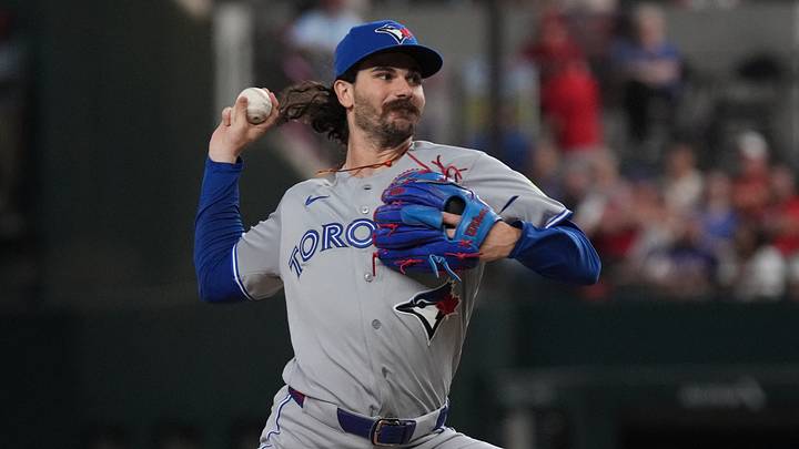 Blue Jays pitcher Dylan Cease (84) throws to the plate against the Rangers. Credit: Raymond Carlin III-Imagn I