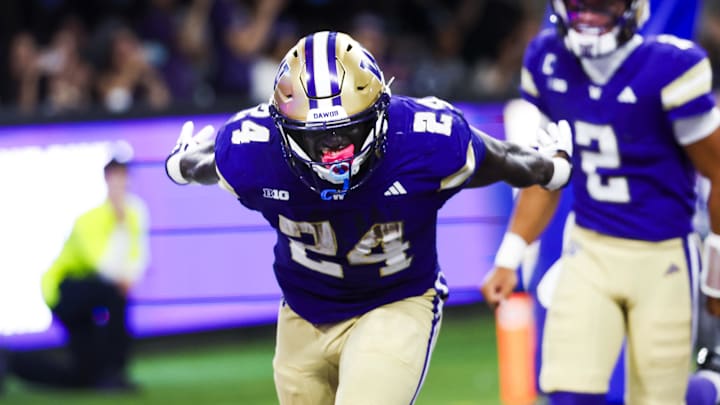 Aug 30, 2025; Seattle, Washington, USA; Washington Huskies running back Adam Mohammed (24) celebrates after rushing for a touchdown against the Colorado State Rams during the second quarter at Husky Stadium. Mandatory Credit: Joe Nicholson-Imagn Images