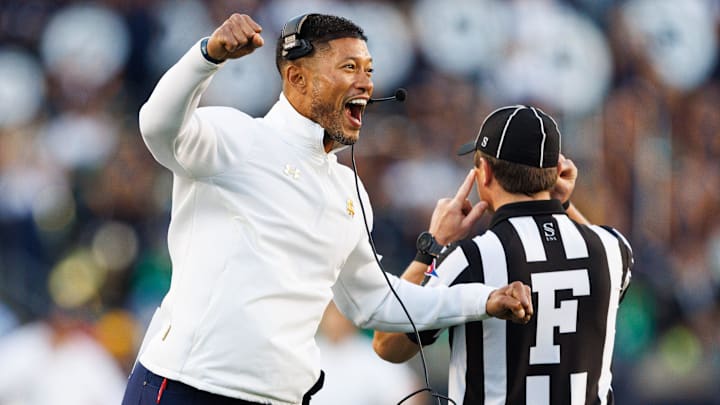 Notre Dame head coach Marcus Freeman celebrates after the defense scored a safety in the second half of a NCAA football game against NC State at Notre Dame Stadium on Saturday, Oct. 11, 2025, in South Bend.