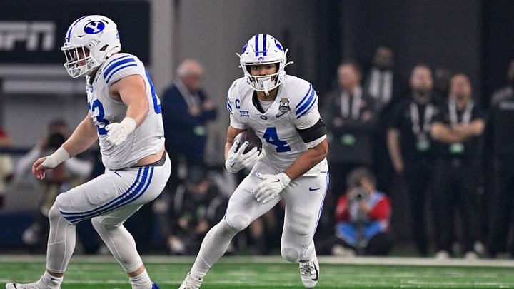 Dec 6, 2025; Arlington, TX, USA; BYU Cougars running back LJ Martin (4) runs with the ball during the game between the Red Raiders and the Cougars at AT&T Stadium. Mandatory Credit: Jerome Miron-Imagn Images Dec 6, 2025; Arlington, TX, USA; BYU Cougars running back LJ Martin (4) runs with the ball during the game between the Red Raiders and the Cougars at AT&T Stadium. Mandatory Credit: Jerome Miron-Imagn Images