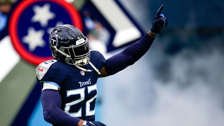 Tennessee Titans running back Derrick Henry (22) waves to fans as he is introduced before a game against the Jacksonville Jaguars at Nissan Stadium in Nashville, Tenn., Sunday, Jan. 7, 2024.