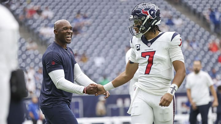 Sep 17, 2023; Houston, Texas, USA; Houston Texans head coach DeMeco Ryans shakes hands with quarterback C.J. Stroud (7) before the game against the Indianapolis Colts at NRG Stadium. Mandatory Credit: Troy Taormina-Imagn Images