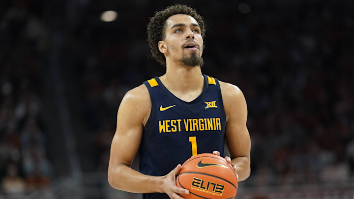 Feb 11, 2023; Austin, Texas, USA; West Virginia Mountaineers forward Emmitt Matthews Jr. (1) shoots a free throw during the first half against the Texas Longhorns at Moody Center. Mandatory Credit: Scott Wachter-Imagn Images