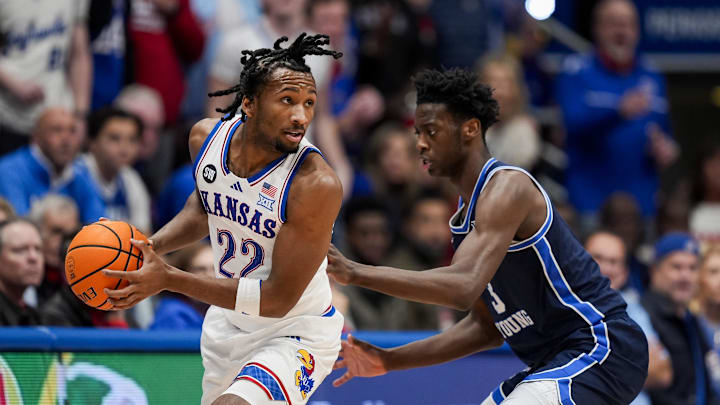 Jan 24, 2026; Columbia, Missouri, USA; Kansas Jayhawks guard Darryn Peterson (22) looks to pass against BYU Cougars forward AJ Dybantsa (3) during the first half at Mizzou Arena. Mandatory Credit: Jay Biggerstaff-Imagn Images