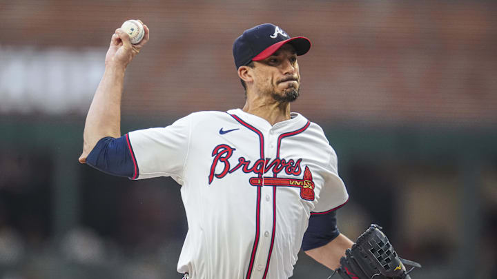 Sep 4, 2024; Cumberland, Georgia, USA; Atlanta Braves pitcher Charlie Morton (50) pitches against the Colorado Rockies during the first inning at Truist Park.