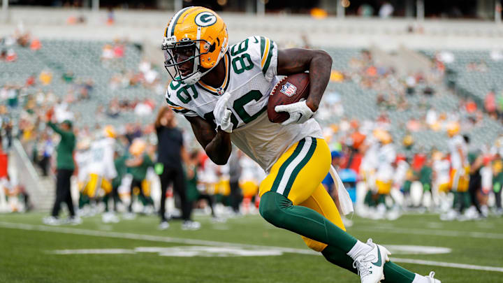 Aug 11, 2023; Cincinnati, Ohio, USA; Green Bay Packers wide receiver Grant DuBose (86) runs with the ball during warmups prior to the game against the Cincinnati Bengals at Paycor Stadium. Mandatory Credit: Katie Stratman-Imagn Images