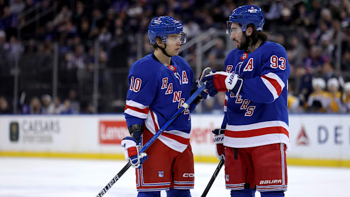 Mar 2, 2025; New York, New York, USA; New York Rangers left wing Artemi Panarin (10) and New York Rangers center Mika Zibanejad (93) talk to one another during the second period against the Nashville Predators at Madison Square Garden. Mandatory Credit: Brad Penner-Imagn Images