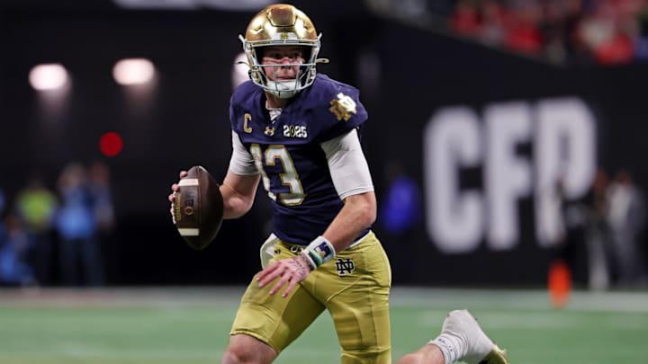 Jan 20, 2025; Atlanta, GA, USA; Notre Dame Fighting Irish quarterback Riley Leonard (13) looks to pass the ball against the Ohio State Buckeyes during the first half the CFP National Championship college football game at Mercedes-Benz Stadium. 