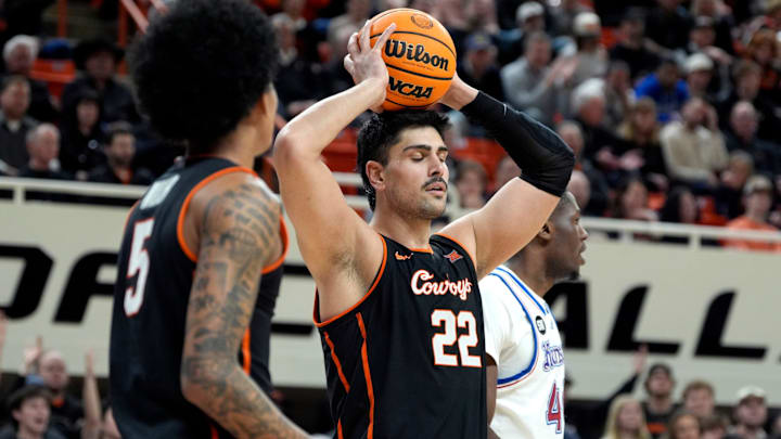 Oklahoma State Cowboys center Parsa Fallah (22) reacts during a men's college basketball game between the Oklahoma State Cowboys and the Kansas Jayhawks at Gallagher-Iba Arena in Stillwater, Okla., Wednesday, Feb. 18, 2026. Oklahoma State Cowboys center Parsa Fallah (22) reacts during a men's college basketball game between the Oklahoma State Cowboys and the Kansas Jayhawks at Gallagher-Iba Arena in Stillwater, Okla., Wednesday, Feb. 18, 2026.